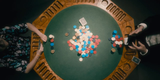 Overhead view of cards and chips on the Mystery Jackpot poker table.