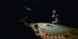 Wide view of the Mystery Jackpot poker-table scene.